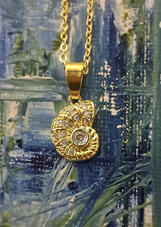 Spiral pendant necklace in golden anti-tarnish coating.