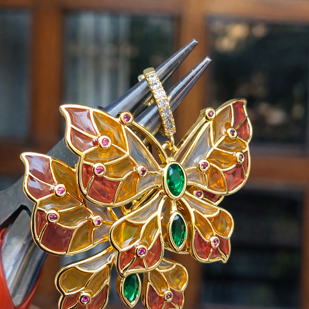 Butterfly earrings with stained glass effect and CZ accents.